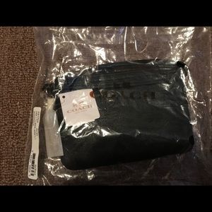Black leather coach wristlet